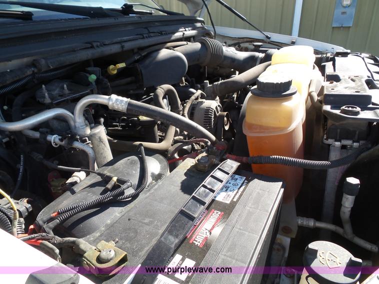 image for item K8242 2004 Ford F350 Super Duty XL utility truck with Hi-Rail/Road rail