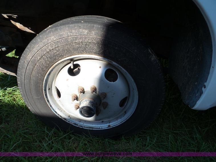 image for item K8242 2004 Ford F350 Super Duty XL utility truck with Hi-Rail/Road rail