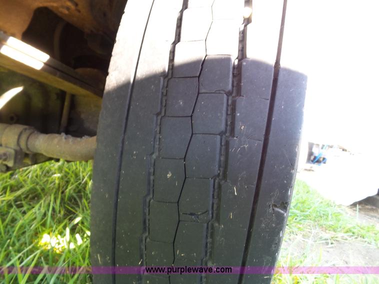 image for item K8242 2004 Ford F350 Super Duty XL utility truck with Hi-Rail/Road rail