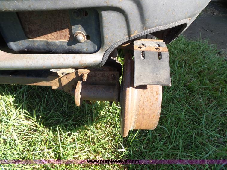 image for item K8242 2004 Ford F350 Super Duty XL utility truck with Hi-Rail/Road rail