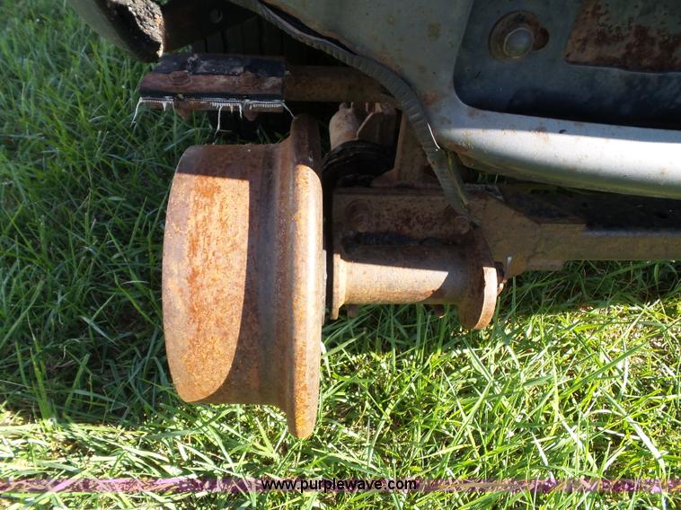 image for item K8242 2004 Ford F350 Super Duty XL utility truck with Hi-Rail/Road rail