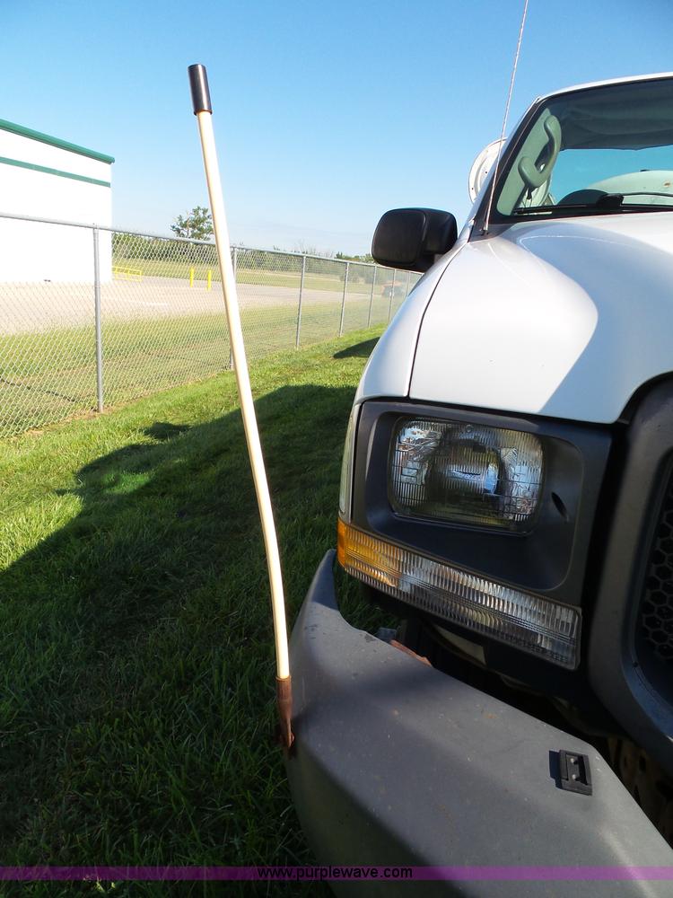 image for item K8242 2004 Ford F350 Super Duty XL utility truck with Hi-Rail/Road rail