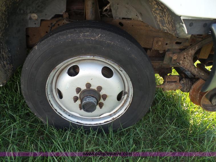 image for item K8242 2004 Ford F350 Super Duty XL utility truck with Hi-Rail/Road rail