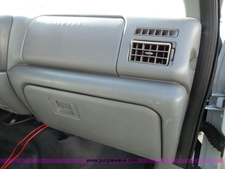 image for item K8242 2004 Ford F350 Super Duty XL utility truck with Hi-Rail/Road rail