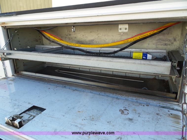 image for item K8242 2004 Ford F350 Super Duty XL utility truck with Hi-Rail/Road rail