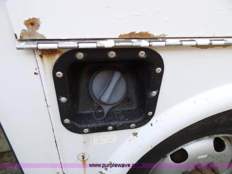 image for item K8242 2004 Ford F350 Super Duty XL utility truck with Hi-Rail/Road rail