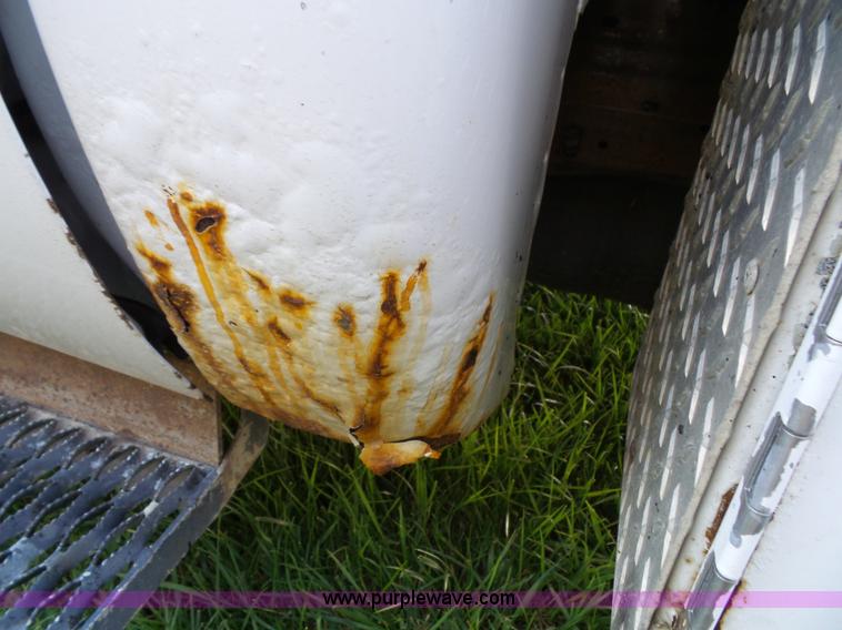 image for item K8242 2004 Ford F350 Super Duty XL utility truck with Hi-Rail/Road rail