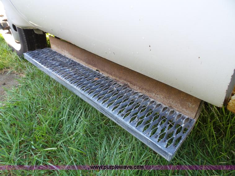 image for item K8242 2004 Ford F350 Super Duty XL utility truck with Hi-Rail/Road rail