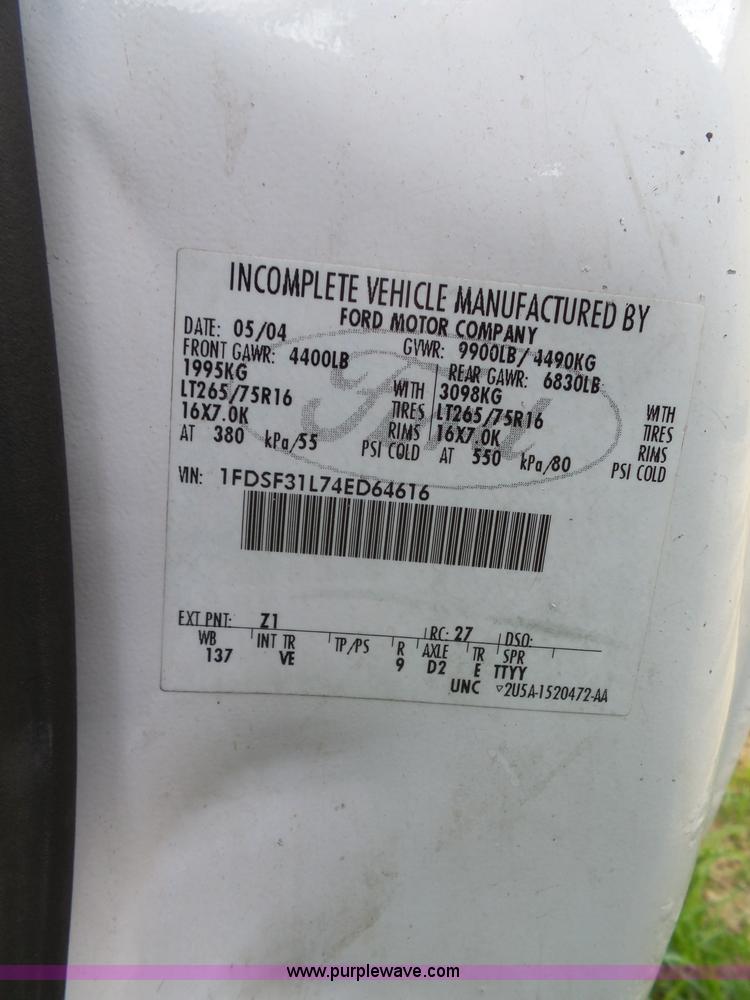 image for item K8242 2004 Ford F350 Super Duty XL utility truck with Hi-Rail/Road rail