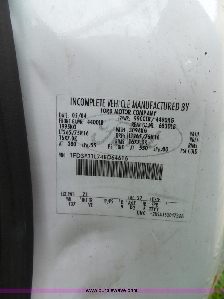 image for item K8242 2004 Ford F350 Super Duty XL utility truck with Hi-Rail/Road rail