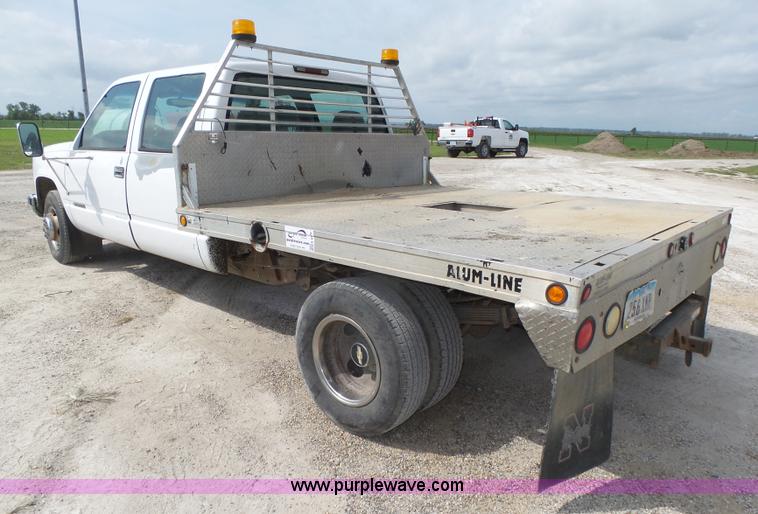 image for item K8476 1999 Chevrolet 3500 LS Crew Cab flatbed pickup truck
