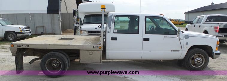 image for item K8476 1999 Chevrolet 3500 LS Crew Cab flatbed pickup truck