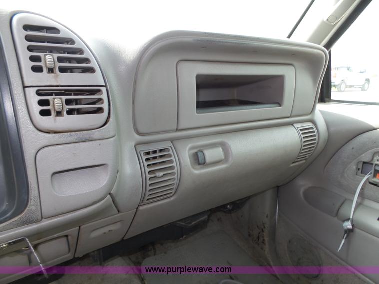 image for item K8476 1999 Chevrolet 3500 LS Crew Cab flatbed pickup truck