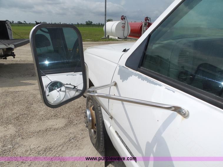 image for item K8476 1999 Chevrolet 3500 LS Crew Cab flatbed pickup truck