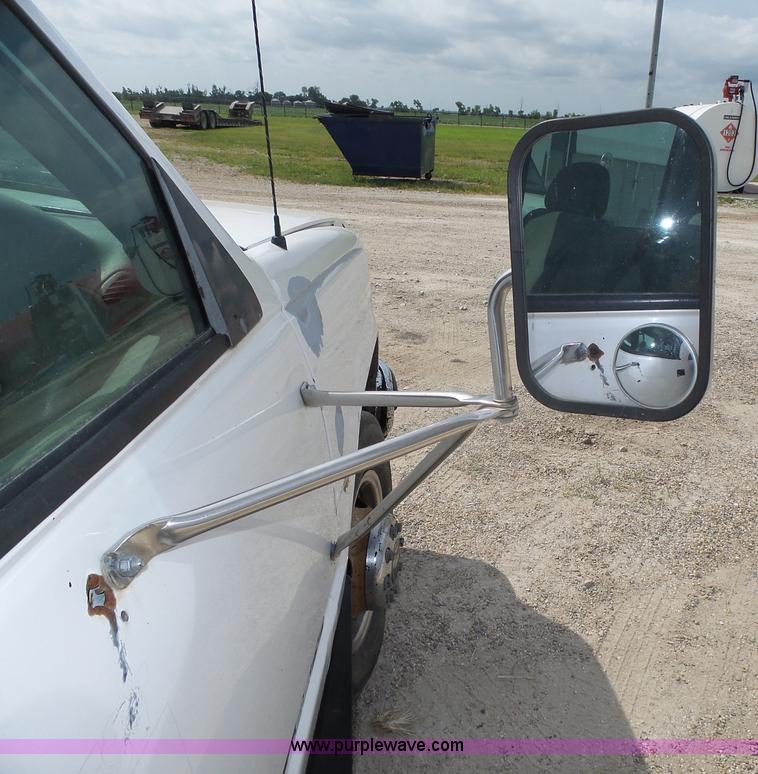 image for item K8476 1999 Chevrolet 3500 LS Crew Cab flatbed pickup truck