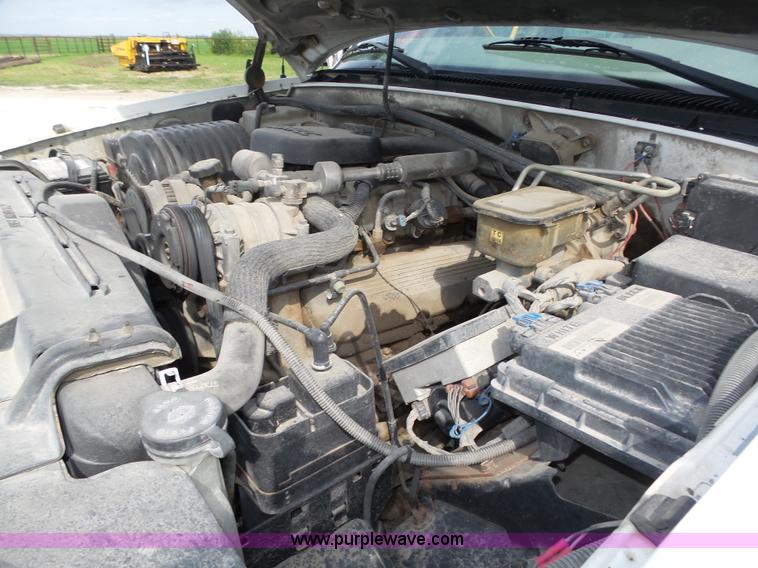 image for item K8476 1999 Chevrolet 3500 LS Crew Cab flatbed pickup truck