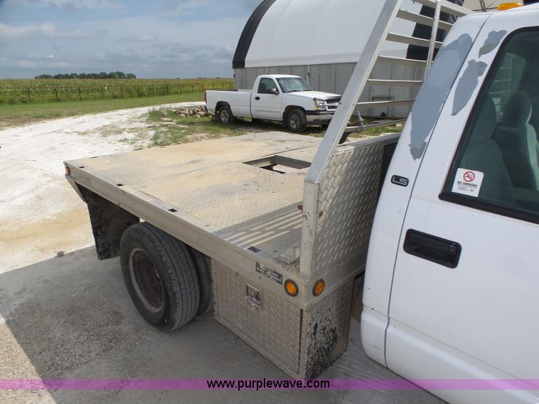 image for item K8476 1999 Chevrolet 3500 LS Crew Cab flatbed pickup truck