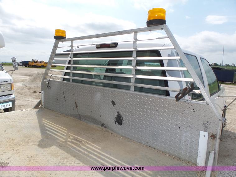 image for item K8476 1999 Chevrolet 3500 LS Crew Cab flatbed pickup truck