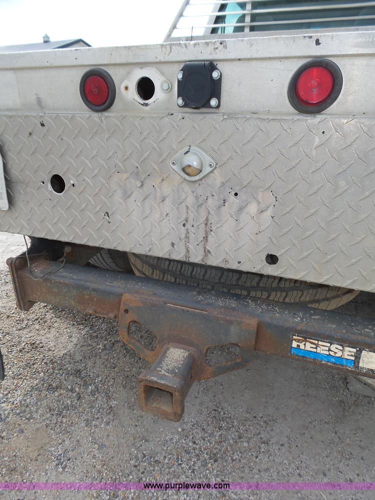 image for item K8476 1999 Chevrolet 3500 LS Crew Cab flatbed pickup truck