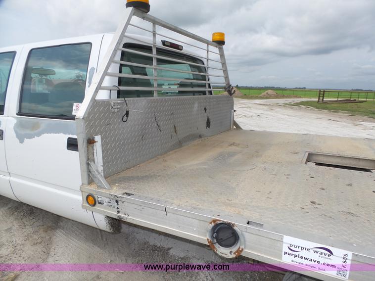 image for item K8476 1999 Chevrolet 3500 LS Crew Cab flatbed pickup truck
