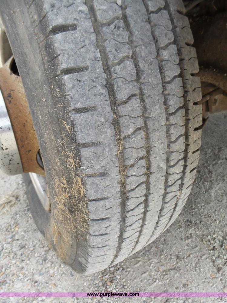 image for item K8476 1999 Chevrolet 3500 LS Crew Cab flatbed pickup truck