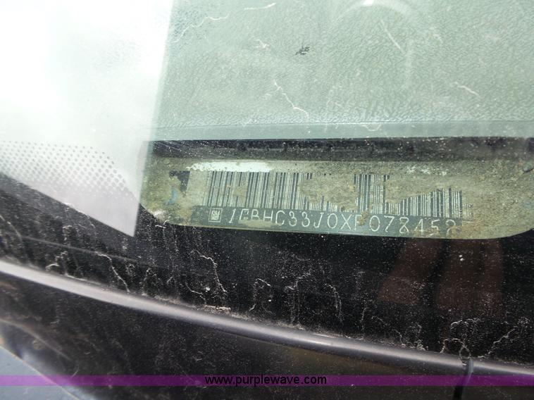 image for item K8476 1999 Chevrolet 3500 LS Crew Cab flatbed pickup truck