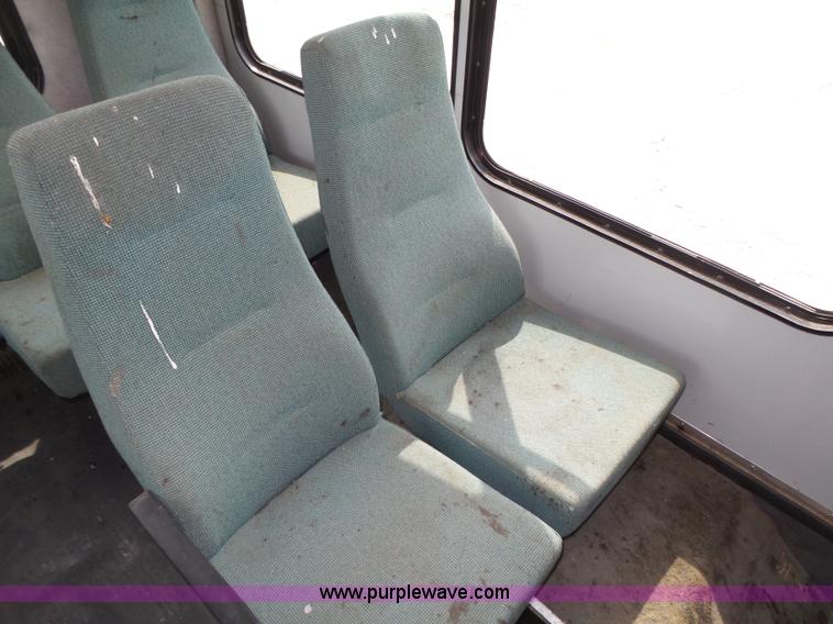 image for item K8477 1999 Ford Econoline E350 Super Duty shuttle bus