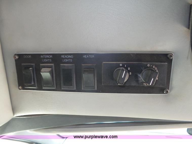 image for item K8477 1999 Ford Econoline E350 Super Duty shuttle bus