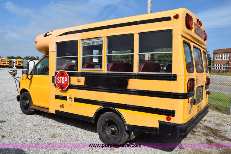 image for item L2541 2001 Chevrolet Express 3500 Cargo Blue Bird school bus