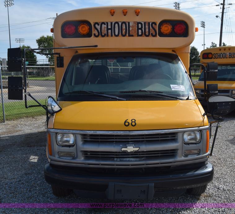 image for item L2541 2001 Chevrolet Express 3500 Cargo Blue Bird school bus