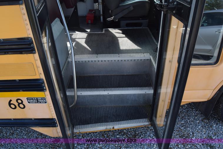 image for item L2541 2001 Chevrolet Express 3500 Cargo Blue Bird school bus