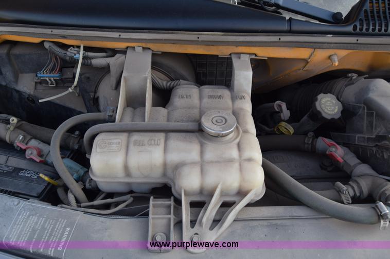 image for item L2541 2001 Chevrolet Express 3500 Cargo Blue Bird school bus