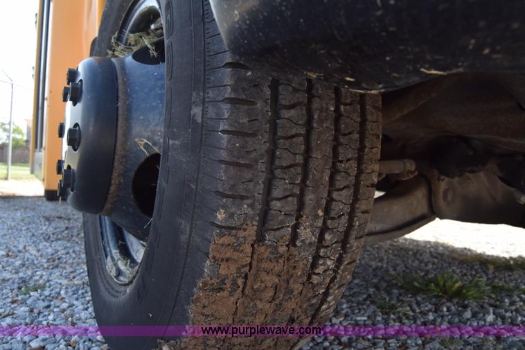 image for item L2541 2001 Chevrolet Express 3500 Cargo Blue Bird school bus