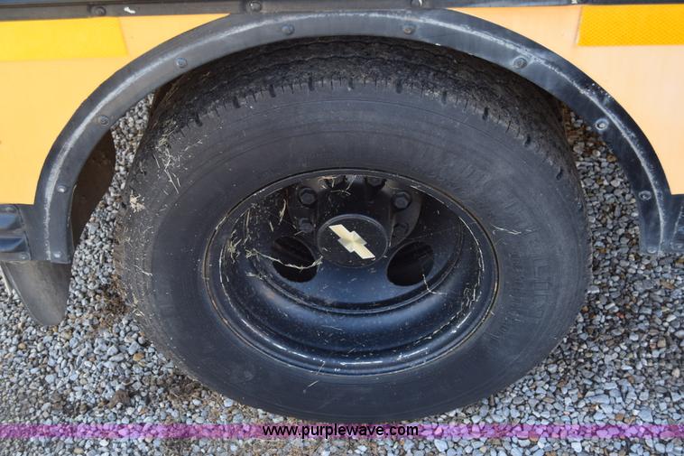 image for item L2541 2001 Chevrolet Express 3500 Cargo Blue Bird school bus