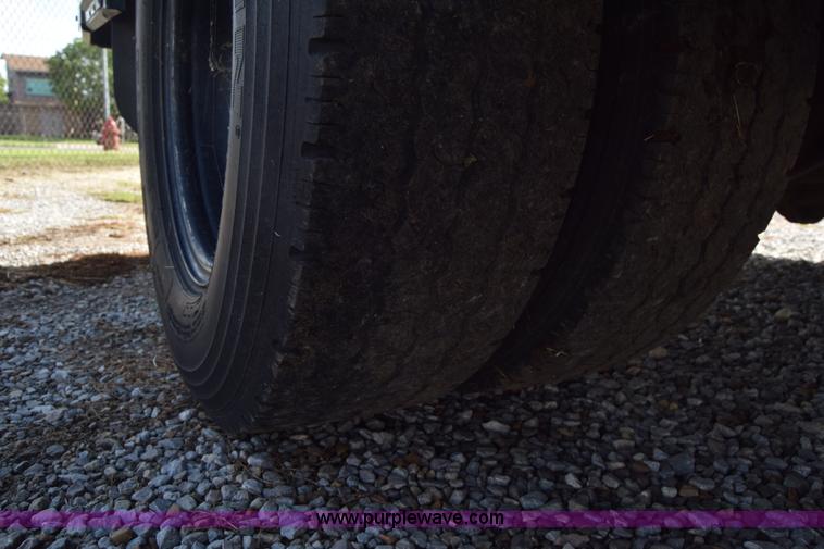 image for item L2541 2001 Chevrolet Express 3500 Cargo Blue Bird school bus