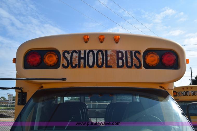 image for item L2541 2001 Chevrolet Express 3500 Cargo Blue Bird school bus