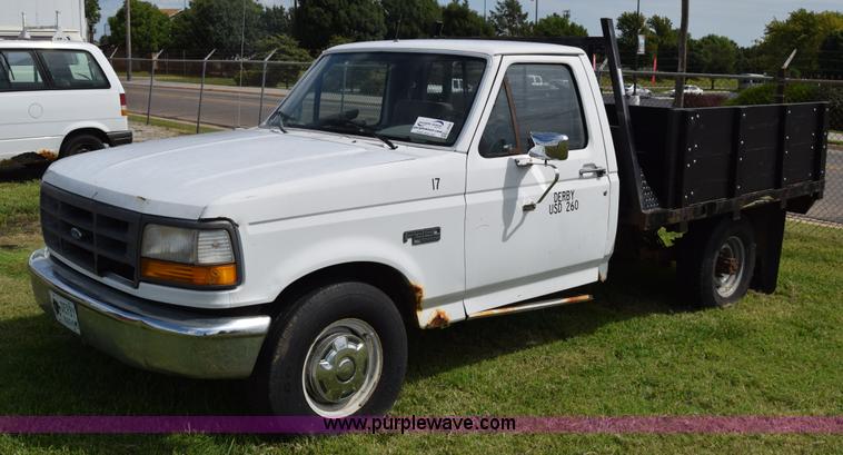 image for item L2558 1994 Ford F250 HD flatbed pickup truck