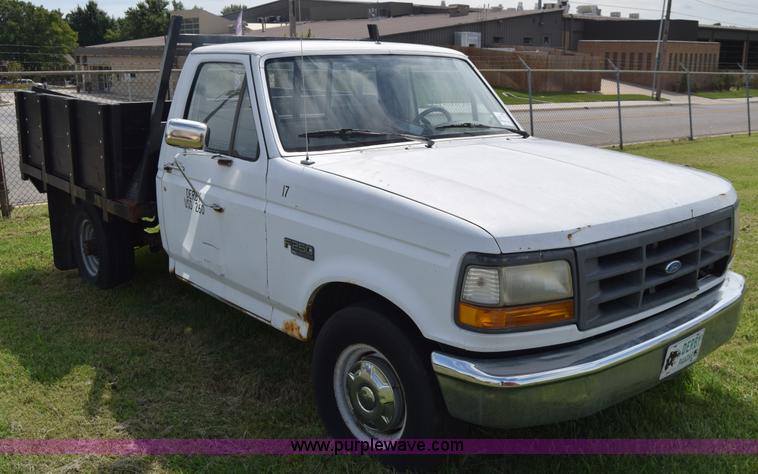 image for item L2558 1994 Ford F250 HD flatbed pickup truck