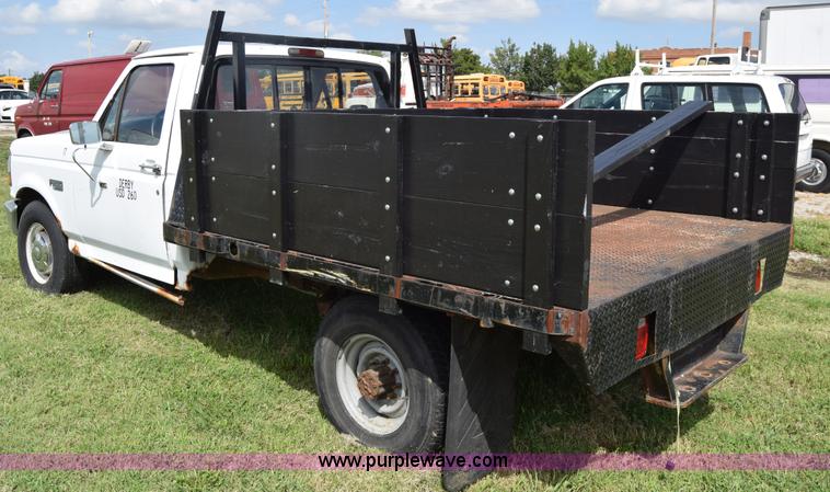 image for item L2558 1994 Ford F250 HD flatbed pickup truck