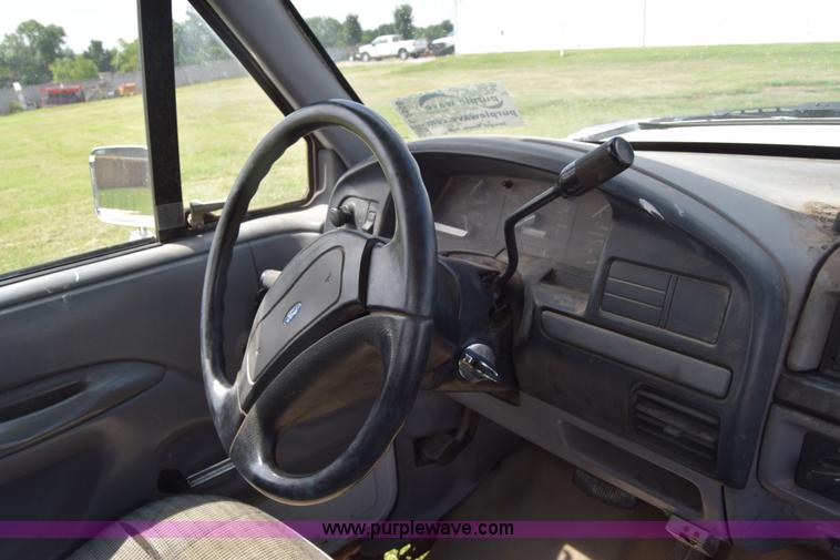 image for item L2558 1994 Ford F250 HD flatbed pickup truck