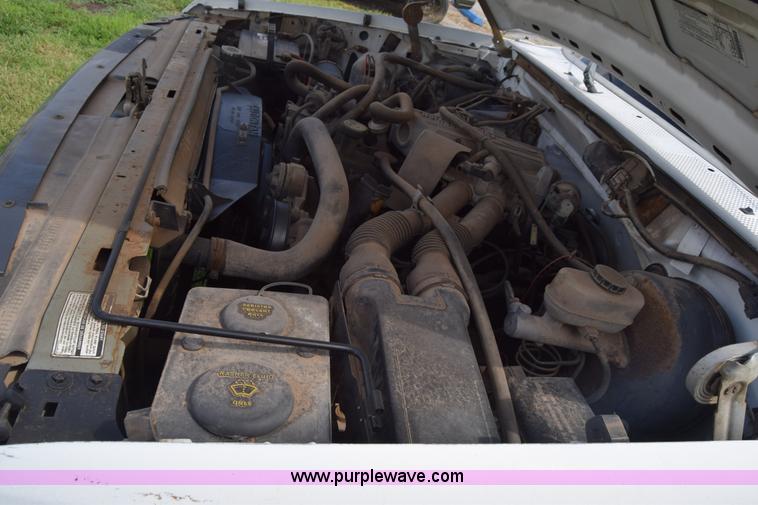 image for item L2558 1994 Ford F250 HD flatbed pickup truck