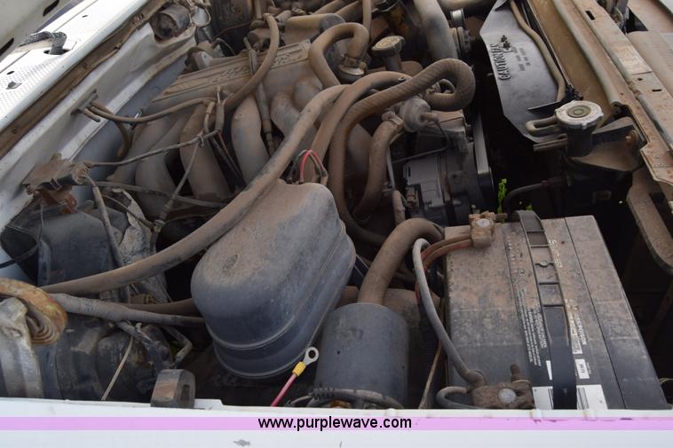 image for item L2558 1994 Ford F250 HD flatbed pickup truck