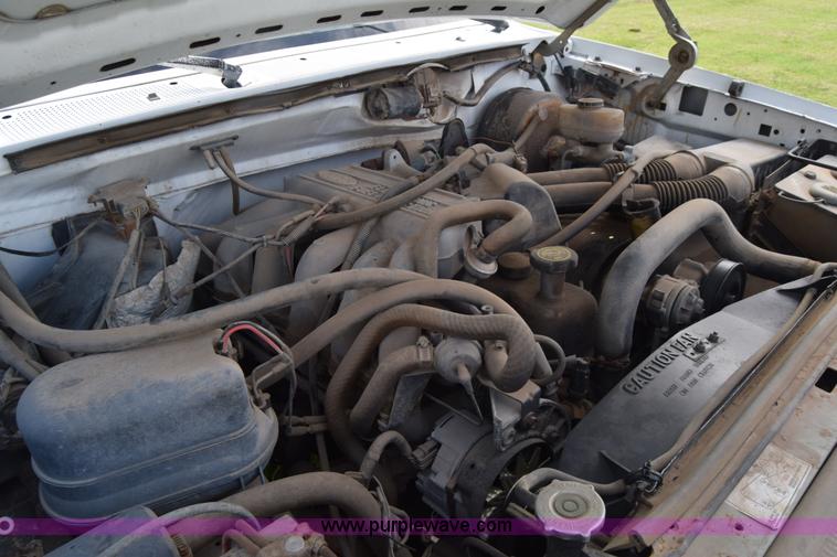 image for item L2558 1994 Ford F250 HD flatbed pickup truck