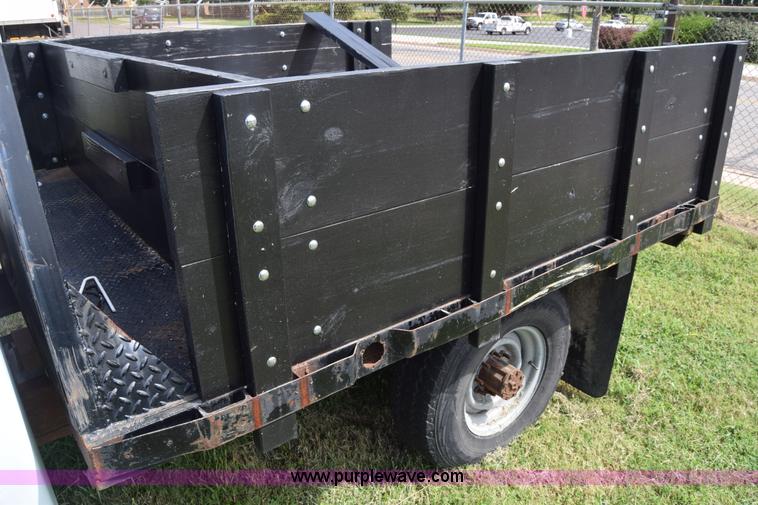 image for item L2558 1994 Ford F250 HD flatbed pickup truck