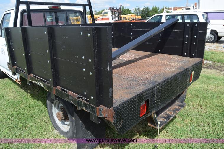 image for item L2558 1994 Ford F250 HD flatbed pickup truck