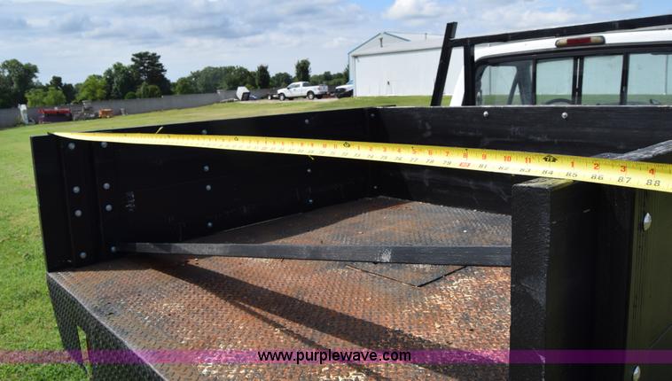 image for item L2558 1994 Ford F250 HD flatbed pickup truck