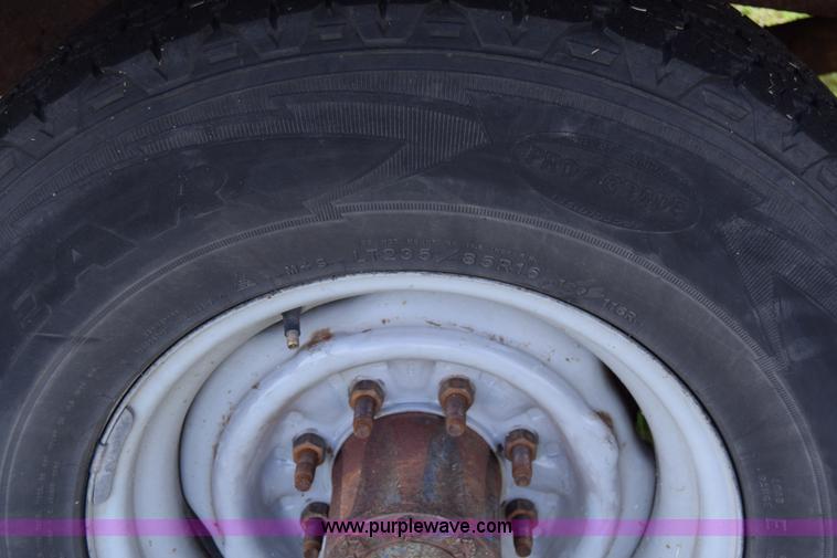 image for item L2558 1994 Ford F250 HD flatbed pickup truck