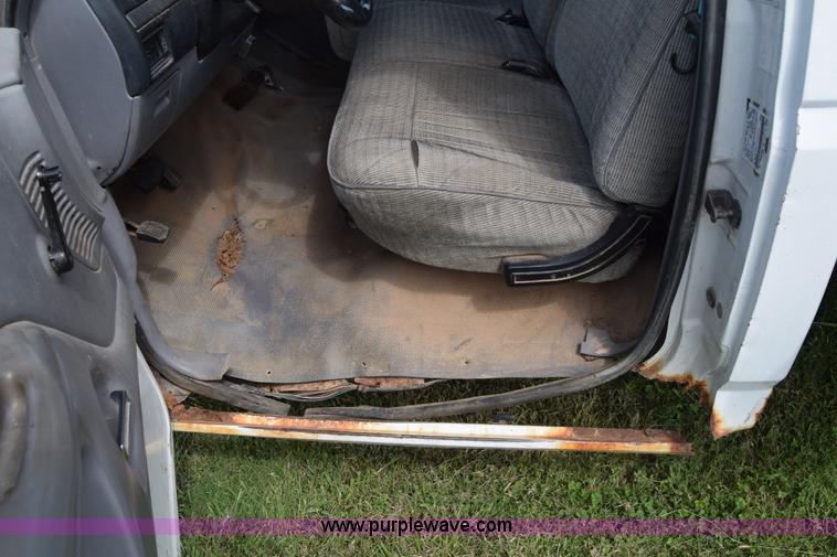 image for item L2558 1994 Ford F250 HD flatbed pickup truck