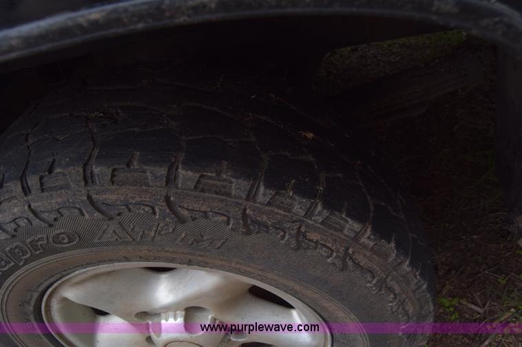 image for item L2573 1999 Dodge Ram 1500 Quad Cab pickup truck