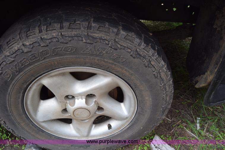 image for item L2573 1999 Dodge Ram 1500 Quad Cab pickup truck